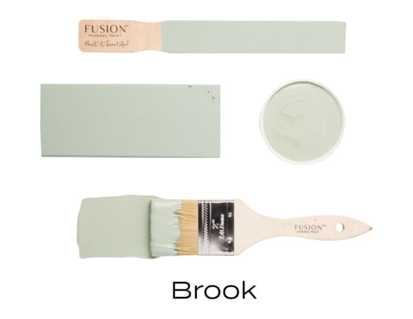 Colour swatches and paintbrush dipped in Brook Fusion Mineral paint.