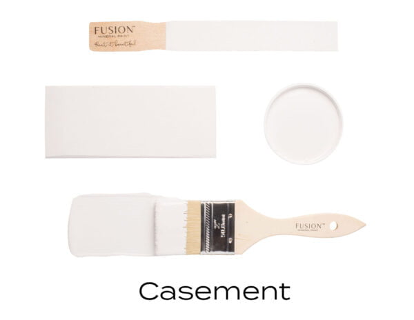 Colour swatches and paintbrush dipped in Casement Fusion Mineral paint.