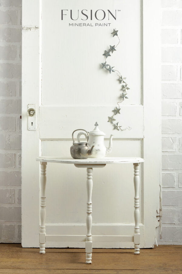 A wooden door and small table painted with the Casement Fusion mineral paint.