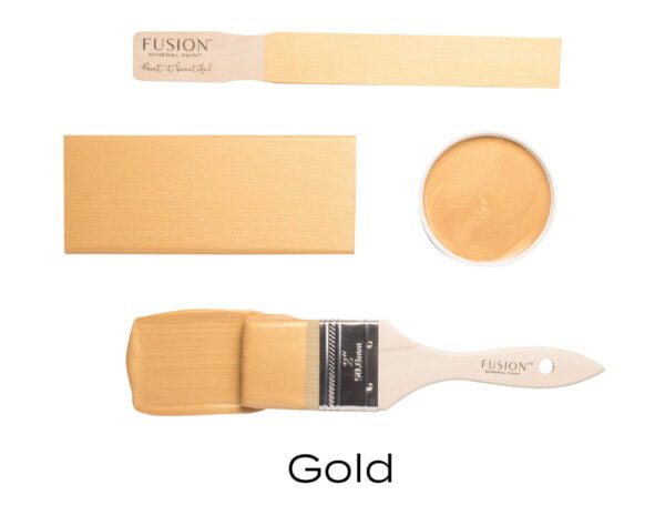 Colour swatches and paintbrush dipped in Gold Fusion Mineral paint.