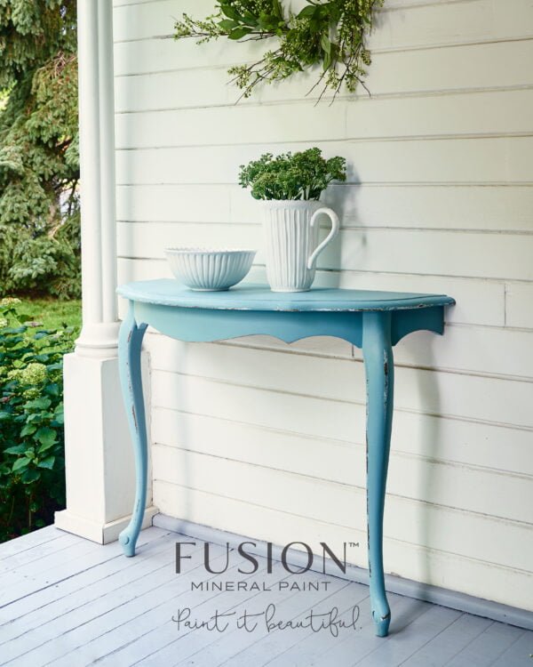 An outdoor table painted with the Heirloom Fusion mineral paint.