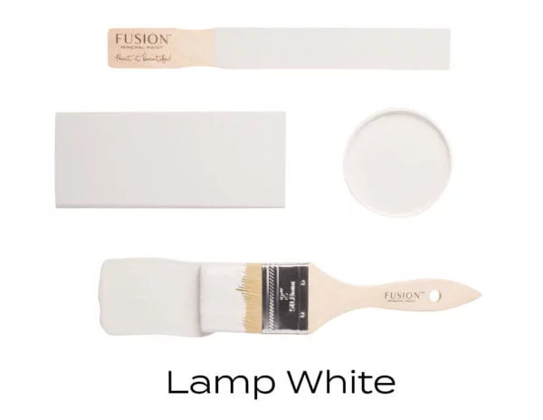 Colour swatches and paintbrush dipped in Lamp White Fusion Mineral paint.