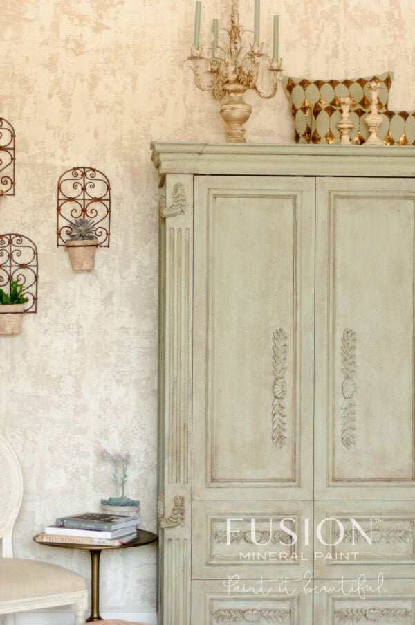 A wooden wardrobe painted with the Lichen Fusion mineral paint.